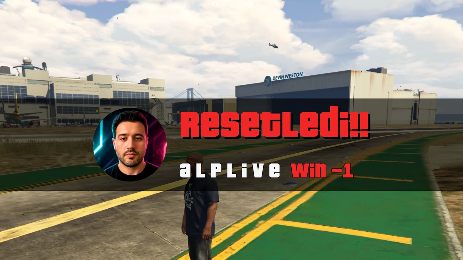 GTA V oyun içi: ekran bandında yayıncının profil resmi, RESETLEDİ!! yazısı, ad ve win −1.